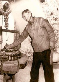 Edward Leedskalnin with some of his extensive, homemade equipment with which he quarried and fabricated the Coral Castle.