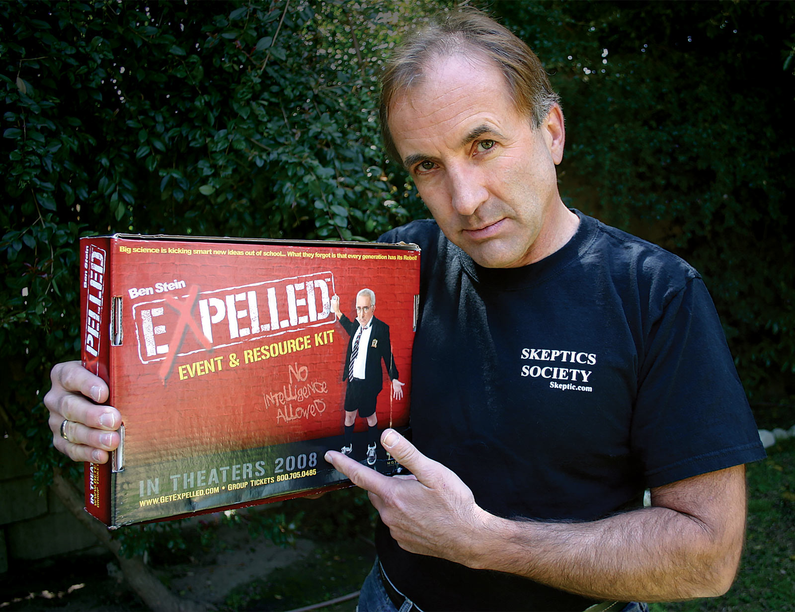 Shermer holding Expelled Press Kit